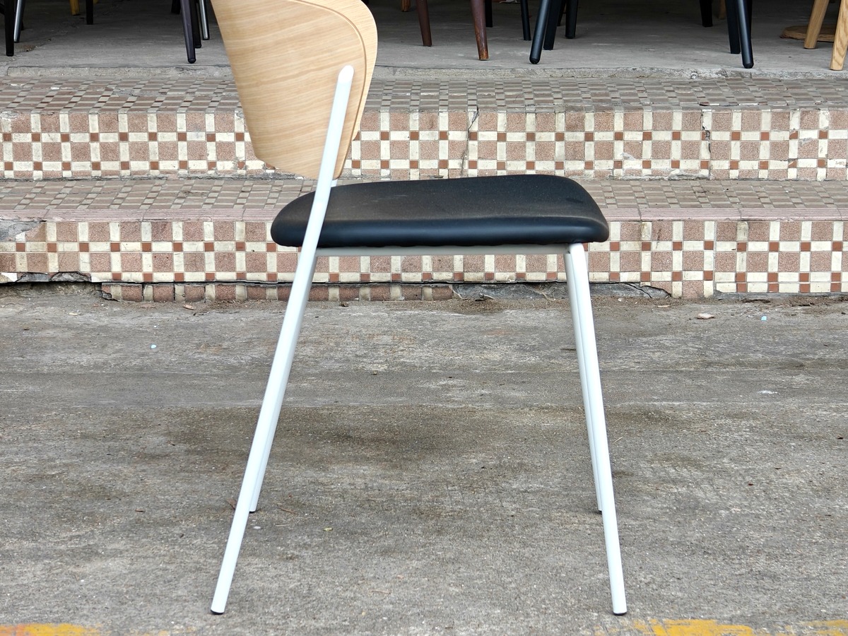 Custom dining chair using a curved plywood back and molded plywood seat.